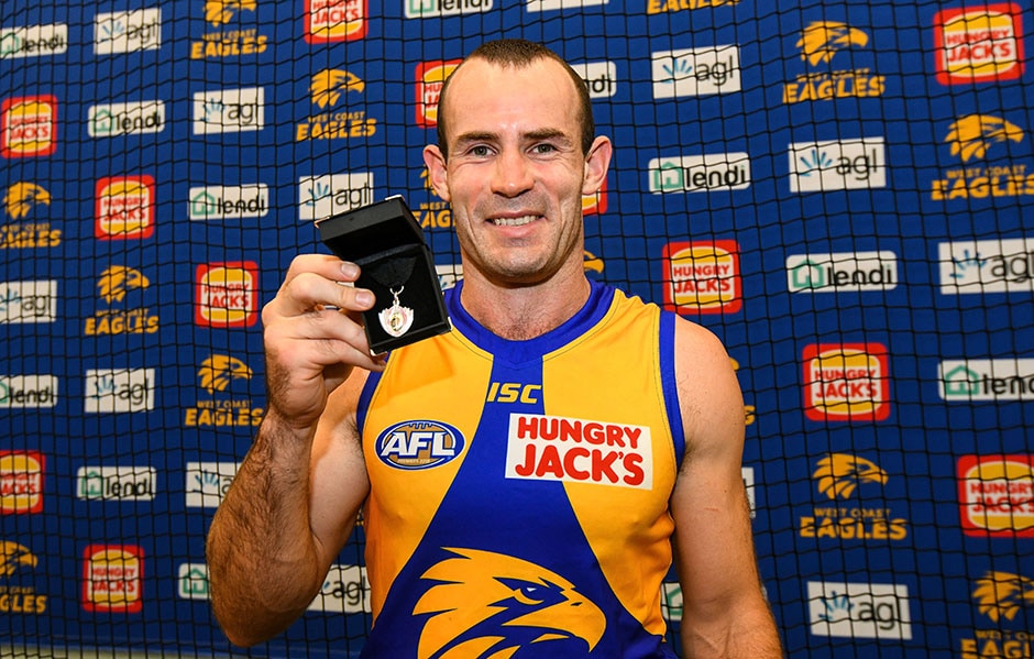 AFL 2019 Round 04 - West Coast v Fremantle PERTH, AUSTRALIA - APRIL 14: Shannon Hurn of the Eagles with his Best on Ground (Glendinning / Allen Medal) during the 2019 AFL round 04 match between the West Coast Eagles and the Fremantle Dockers at Optus Stadium on April 14, 2019 in Perth, Australia. (Photo by Daniel Carson/AFL Photos)